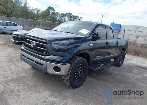2011 Toyota Tundra Grade 5.7L V8 z USA, uszkodzony, nr VIN 5TFRY5F18BX100175